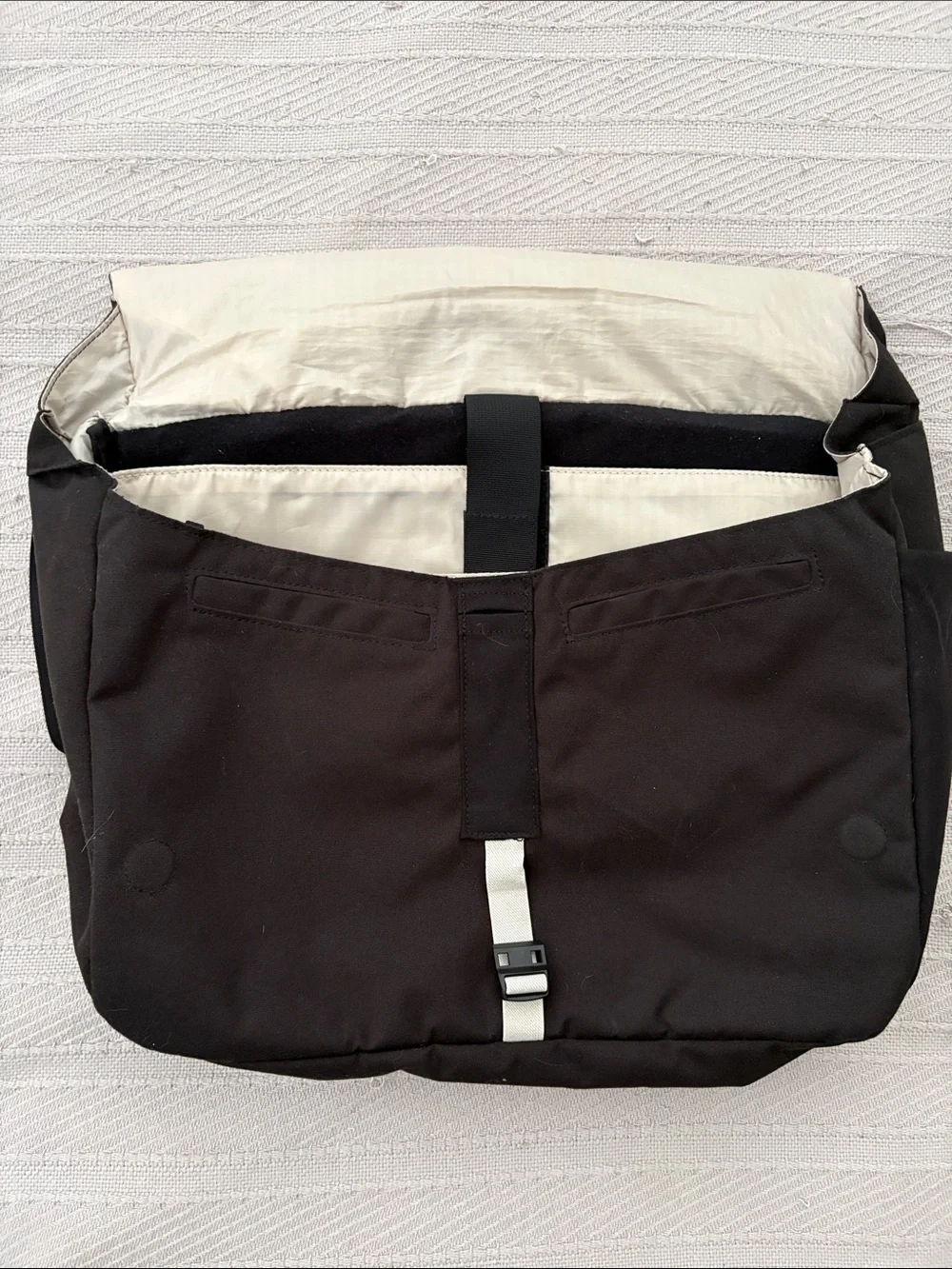 cotopaxi Black Messenger Bag with Cream Stripe